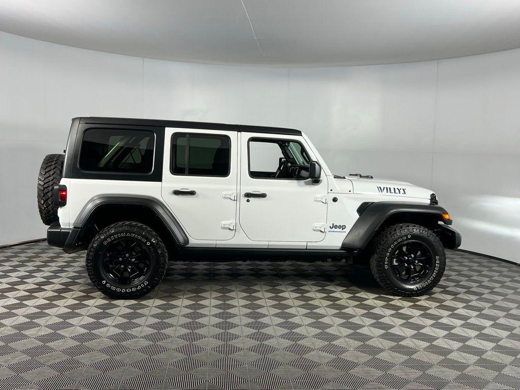 used 2023 Jeep Wrangler 4xe car, priced at $26,173