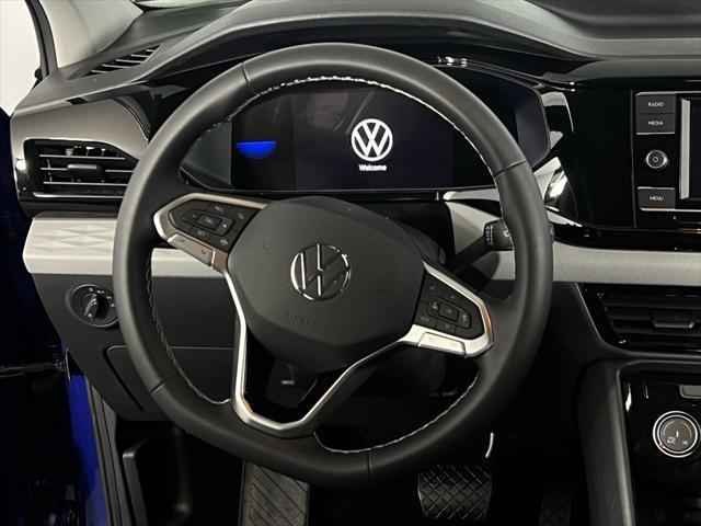 used 2023 Volkswagen Taos car, priced at $23,573