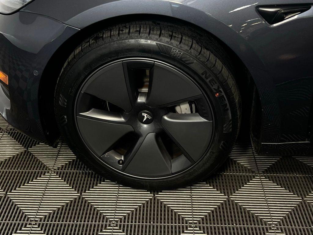 used 2022 Tesla Model 3 car, priced at $23,673