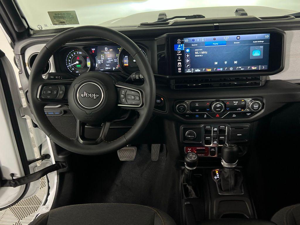 used 2024 Jeep Wrangler 4xe car, priced at $36,173