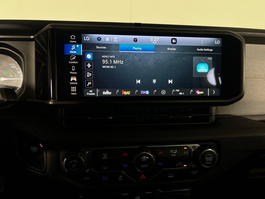 used 2024 Jeep Wrangler 4xe car, priced at $36,173