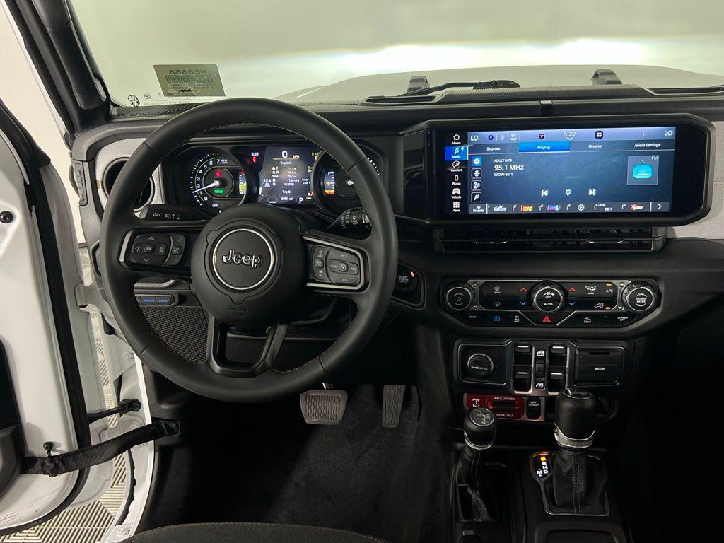 used 2024 Jeep Wrangler 4xe car, priced at $36,173