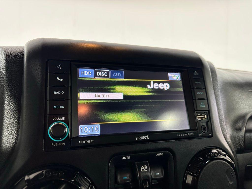 used 2014 Jeep Wrangler Unlimited car, priced at $18,395