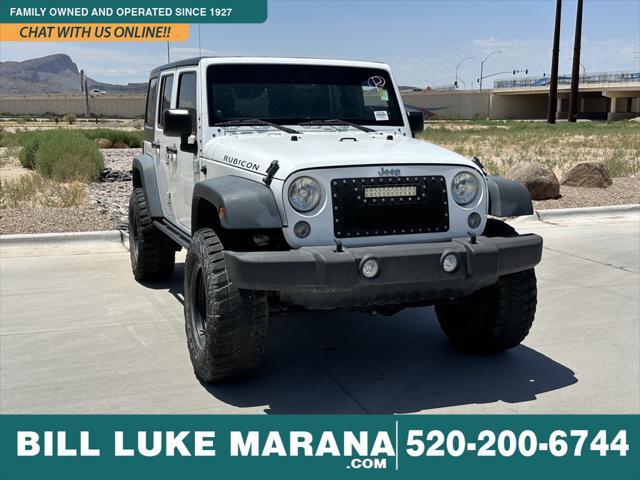 used 2014 Jeep Wrangler Unlimited car, priced at $24,473