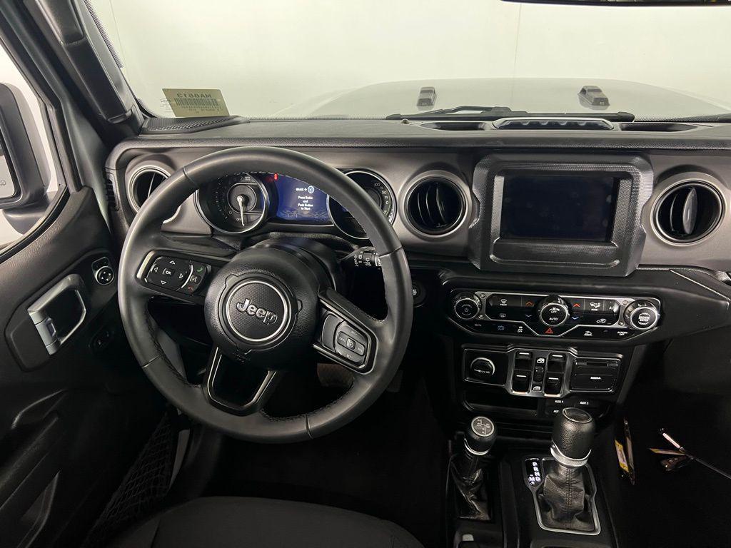 used 2023 Jeep Wrangler 4xe car, priced at $29,373