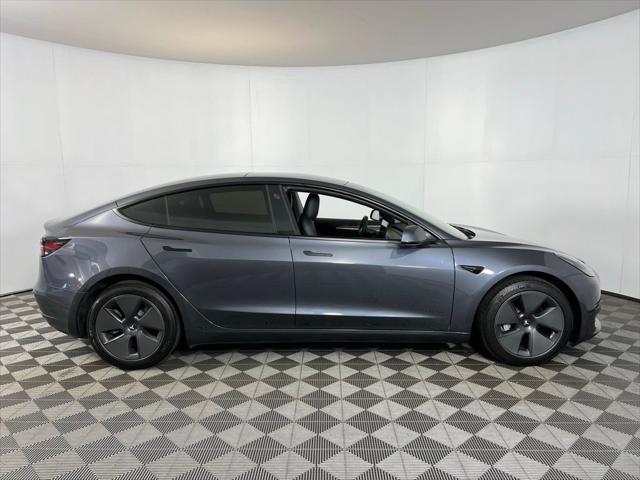 used 2022 Tesla Model 3 car, priced at $29,575