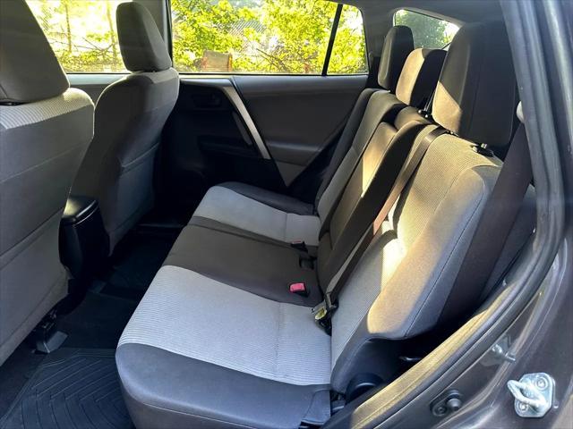 used 2013 Toyota RAV4 car, priced at $10,999