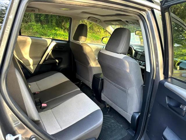 used 2013 Toyota RAV4 car, priced at $10,999