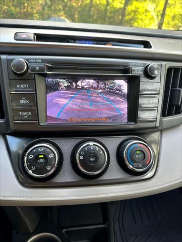 used 2013 Toyota RAV4 car, priced at $10,999