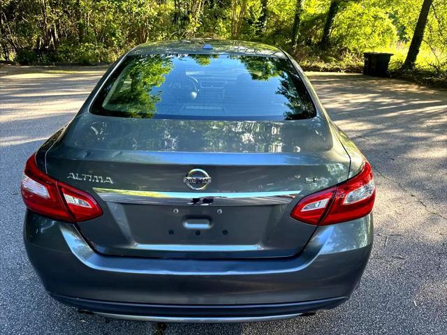used 2017 Nissan Altima car, priced at $9,999