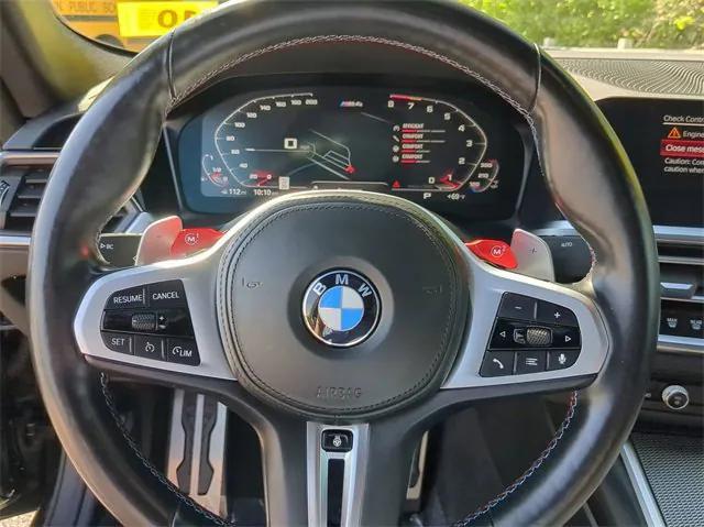 used 2022 BMW M4 car, priced at $70,000