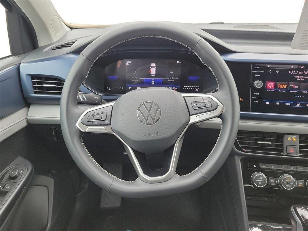 used 2024 Volkswagen Taos car, priced at $22,253
