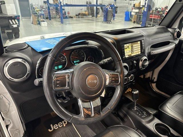 used 2015 Jeep Wrangler Unlimited car, priced at $25,969