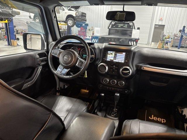 used 2015 Jeep Wrangler Unlimited car, priced at $25,969