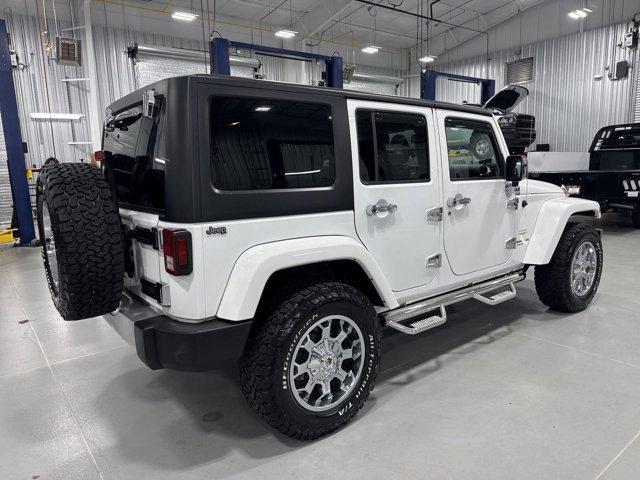 used 2015 Jeep Wrangler Unlimited car, priced at $25,969