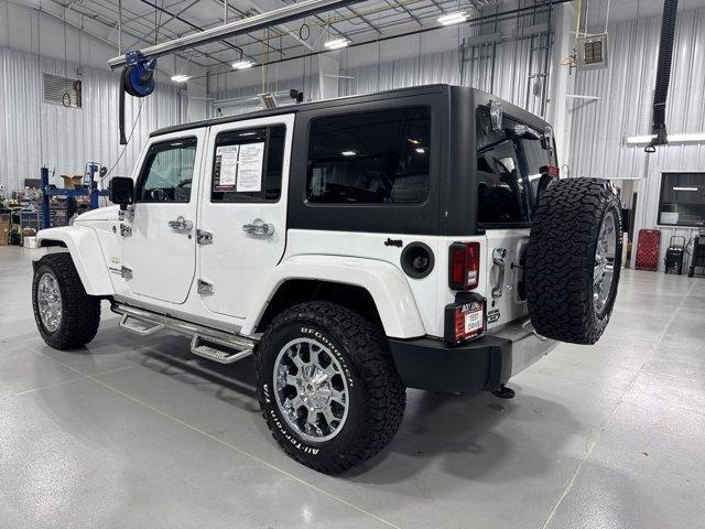 used 2015 Jeep Wrangler Unlimited car, priced at $25,969