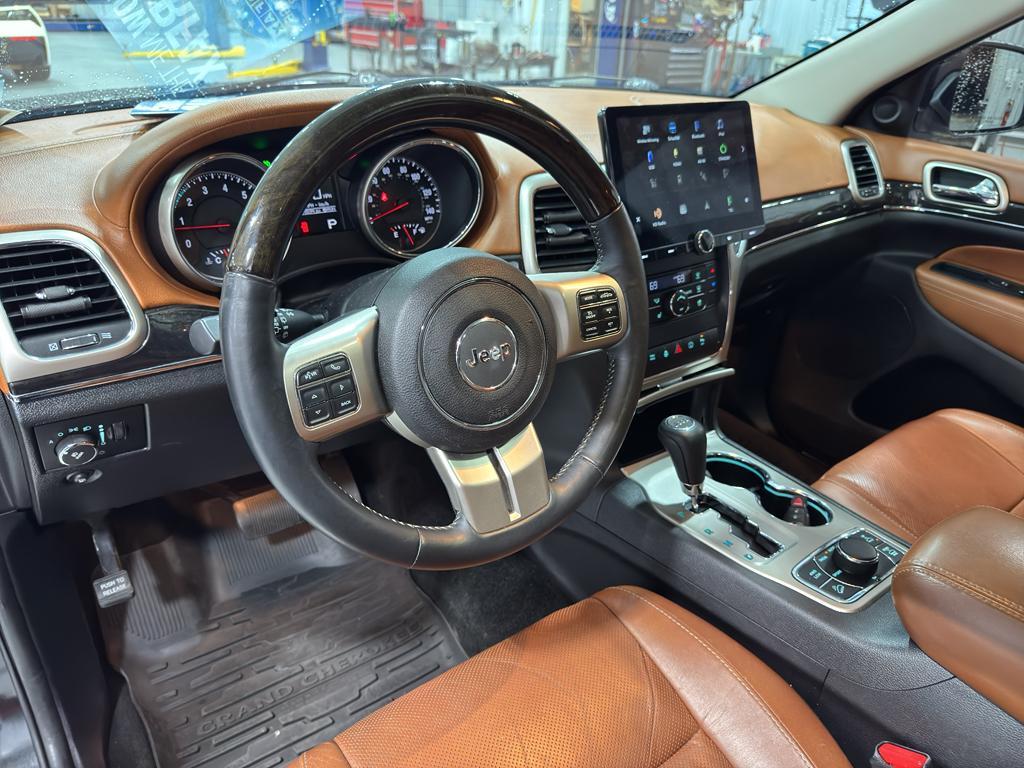 used 2013 Jeep Grand Cherokee car, priced at $21,869