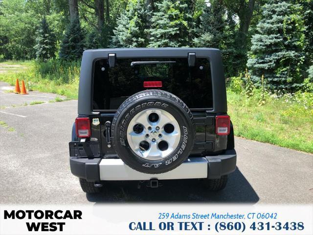 used 2014 Jeep Wrangler Unlimited car, priced at $21,895