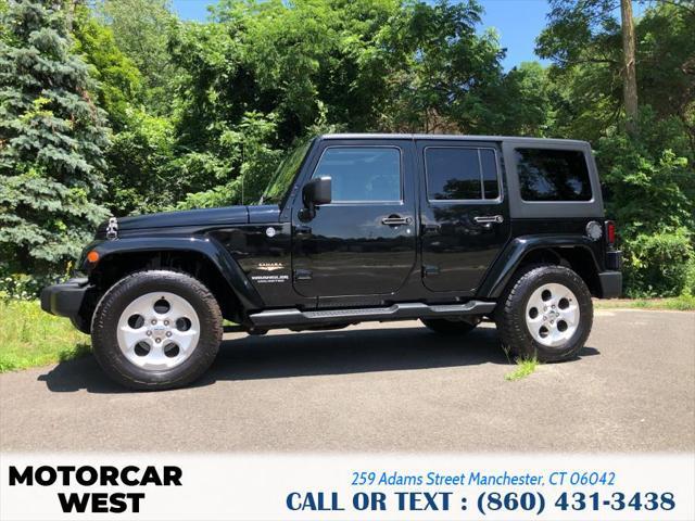 used 2014 Jeep Wrangler Unlimited car, priced at $21,895