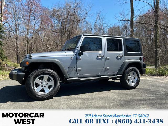 used 2014 Jeep Wrangler Unlimited car, priced at $18,981