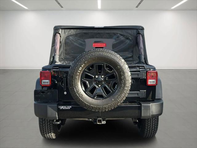 used 2016 Jeep Wrangler Unlimited car, priced at $20,605