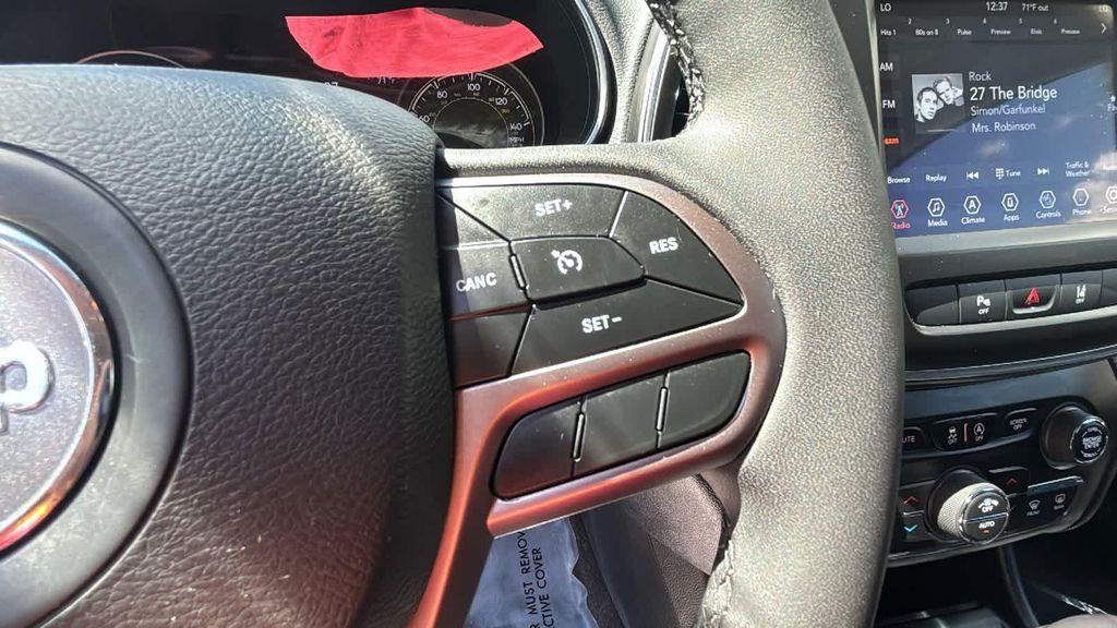 used 2021 Jeep Cherokee car, priced at $23,428
