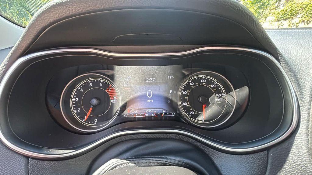 used 2021 Jeep Cherokee car, priced at $23,428