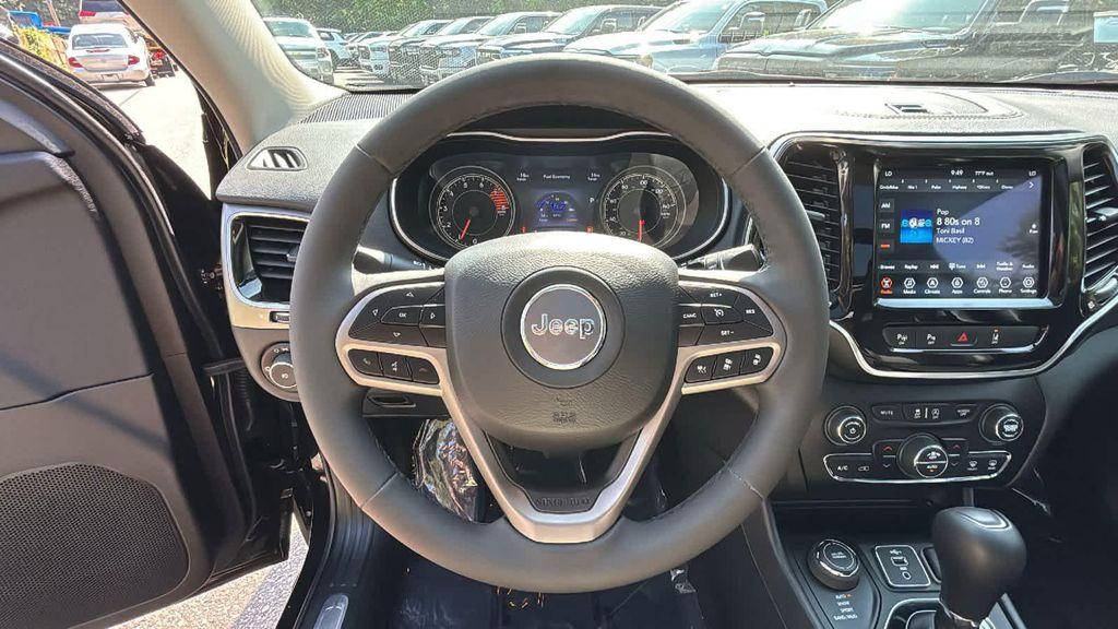 used 2021 Jeep Cherokee car, priced at $25,677