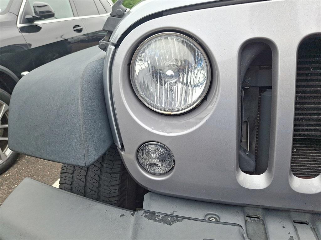 used 2015 Jeep Wrangler Unlimited car, priced at $17,593