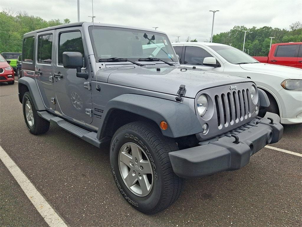 used 2015 Jeep Wrangler Unlimited car, priced at $17,593