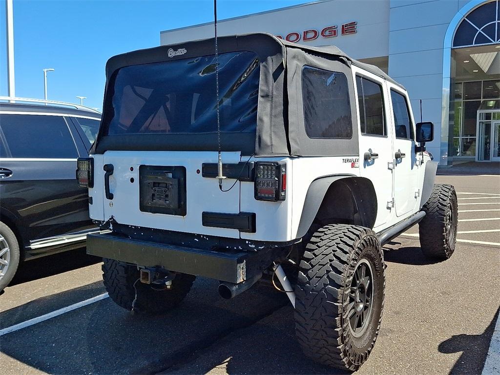 used 2011 Jeep Wrangler Unlimited car, priced at $12,952
