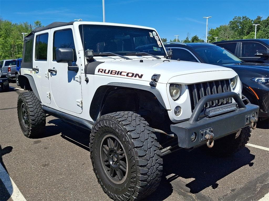 used 2011 Jeep Wrangler Unlimited car, priced at $12,952