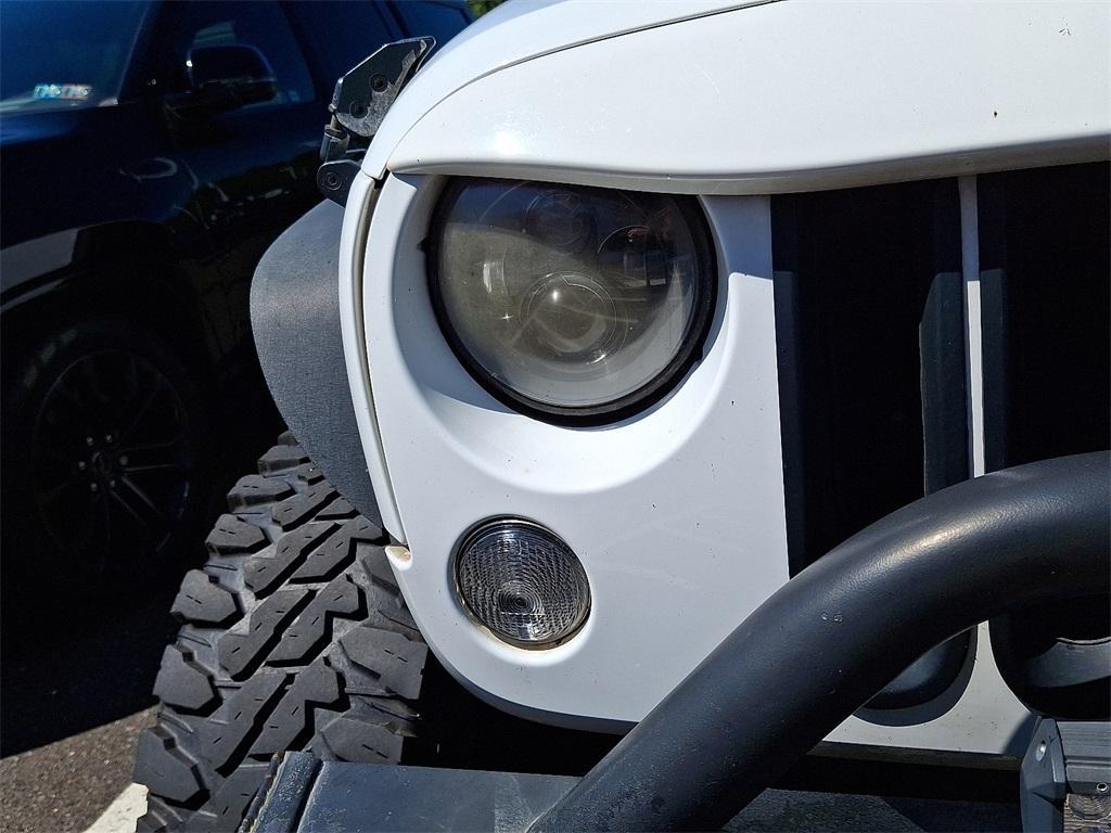 used 2011 Jeep Wrangler Unlimited car, priced at $12,952