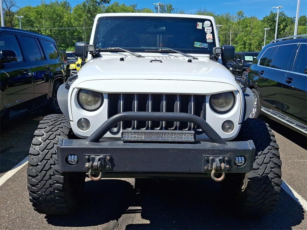 used 2011 Jeep Wrangler Unlimited car, priced at $12,952