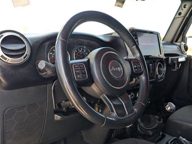 used 2015 Jeep Wrangler Unlimited car, priced at $18,991