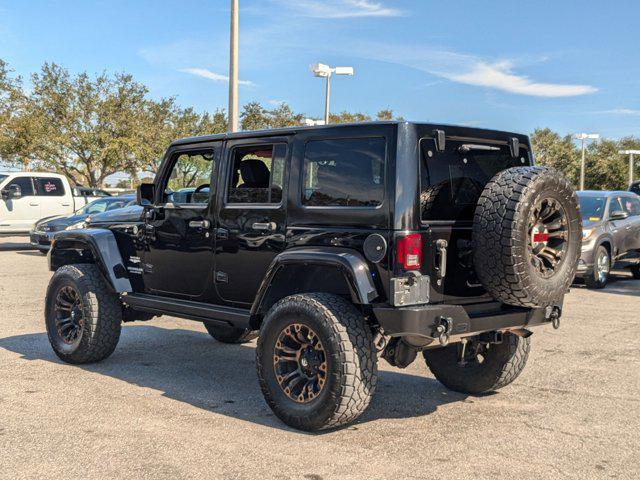 used 2015 Jeep Wrangler Unlimited car, priced at $18,991