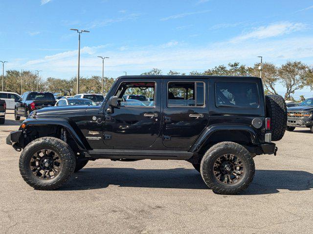 used 2015 Jeep Wrangler Unlimited car, priced at $18,991