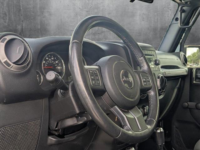 used 2017 Jeep Wrangler Unlimited car, priced at $26,491