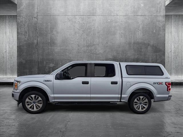 used 2018 Ford F-150 car, priced at $23,382