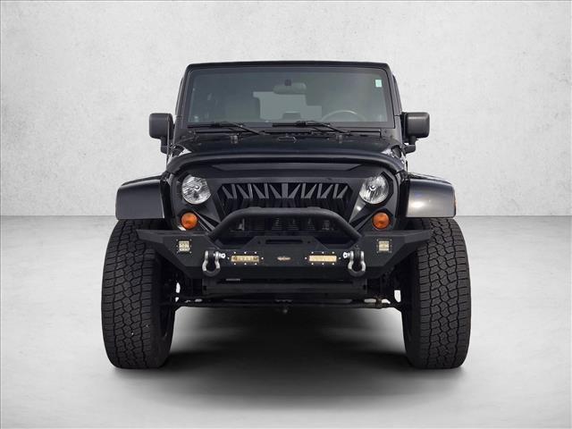 used 2010 Jeep Wrangler Unlimited car, priced at $12,391