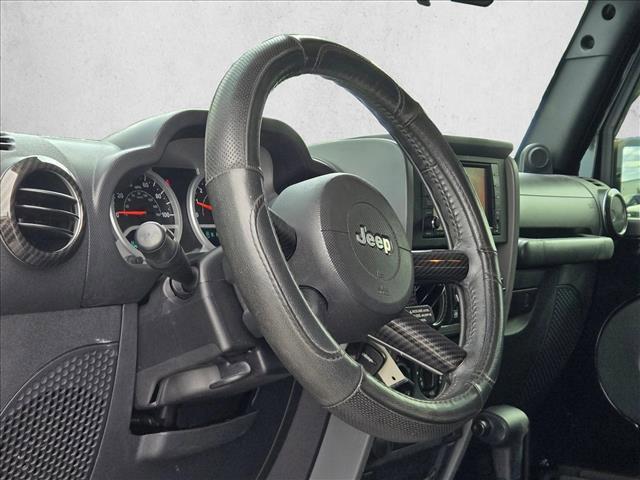 used 2010 Jeep Wrangler Unlimited car, priced at $12,391