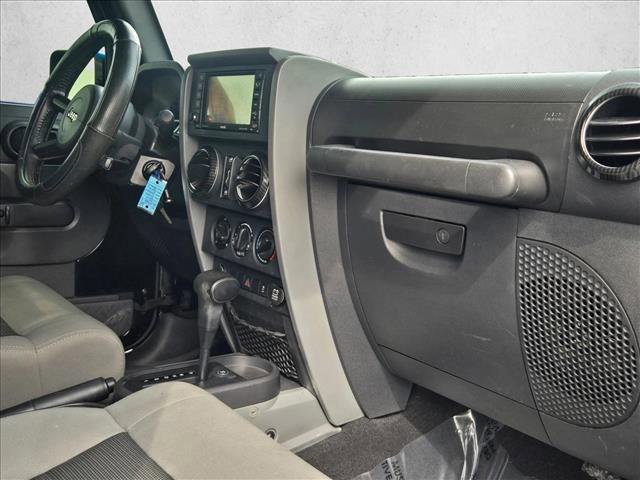 used 2010 Jeep Wrangler Unlimited car, priced at $12,391