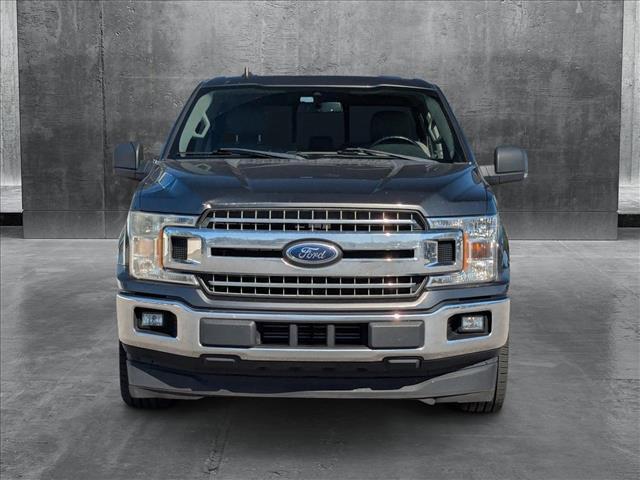 used 2019 Ford F-150 car, priced at $23,564