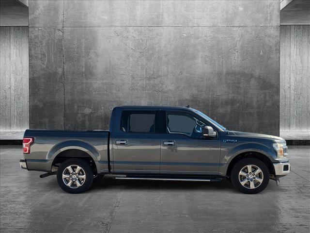 used 2019 Ford F-150 car, priced at $23,564