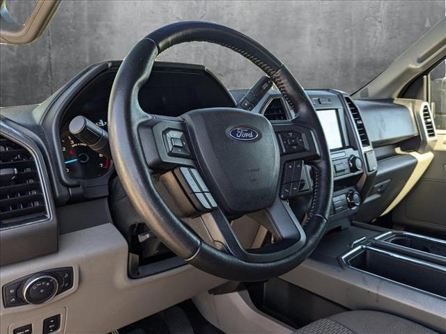 used 2019 Ford F-150 car, priced at $23,564