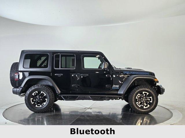 used 2024 Jeep Wrangler 4xe car, priced at $42,597