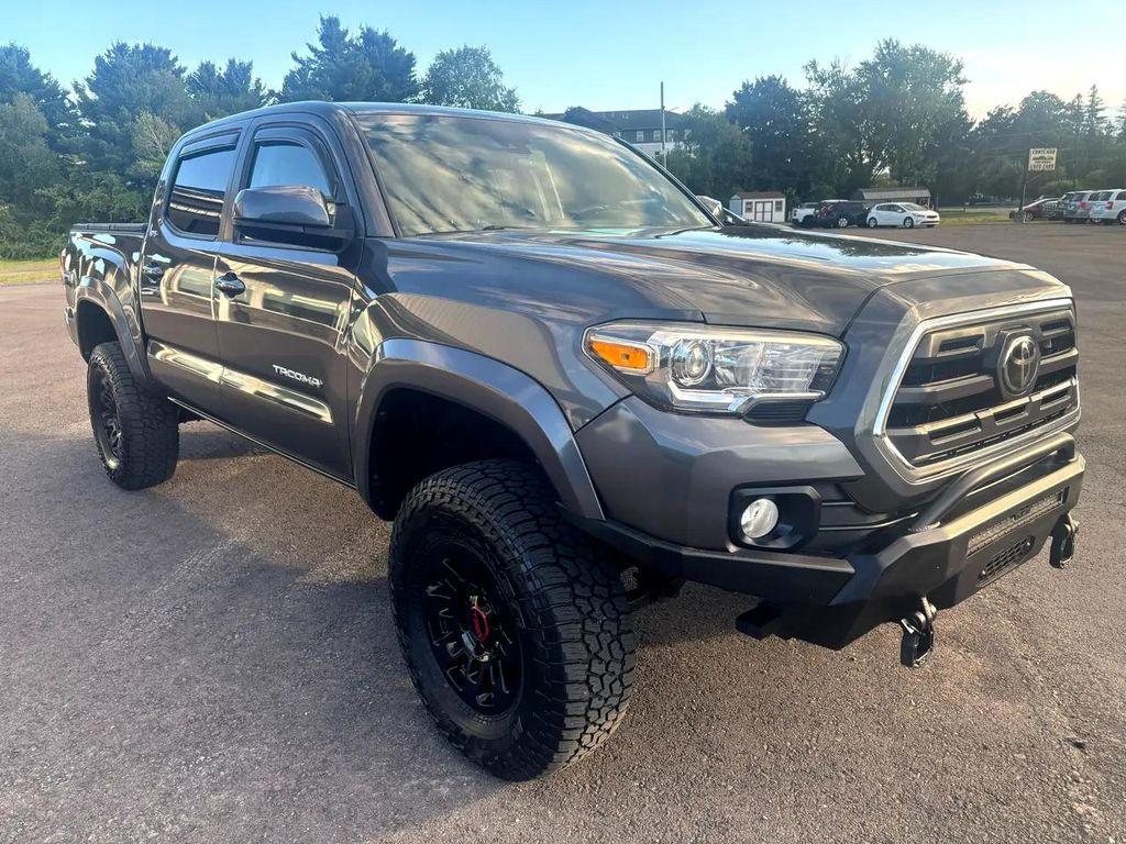 used 2018 Toyota Tacoma car, priced at $27,600