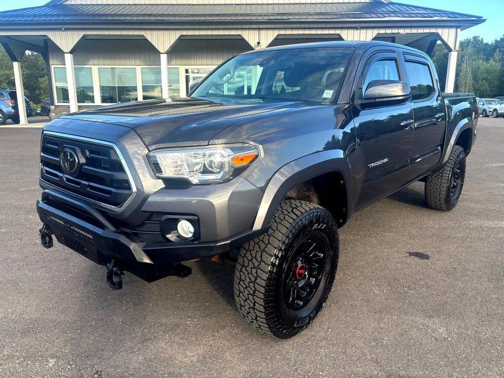 used 2018 Toyota Tacoma car, priced at $27,600
