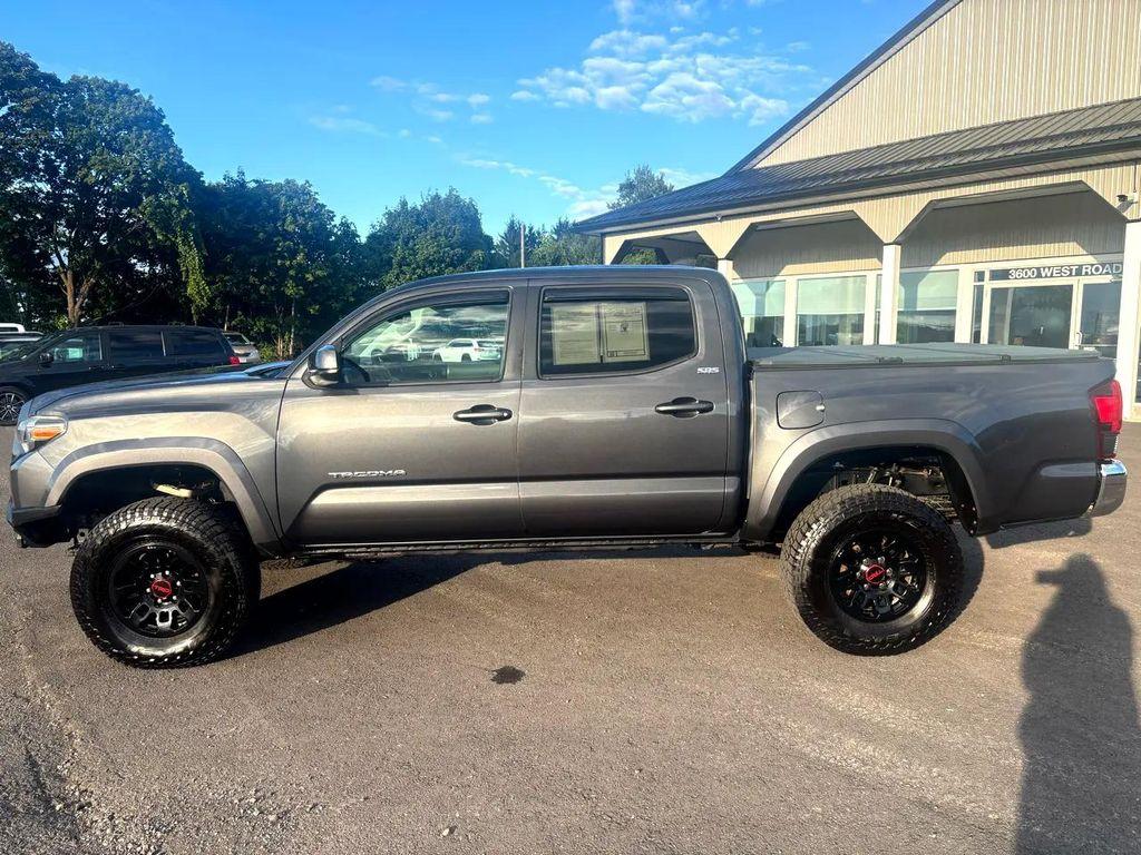 used 2018 Toyota Tacoma car, priced at $27,600