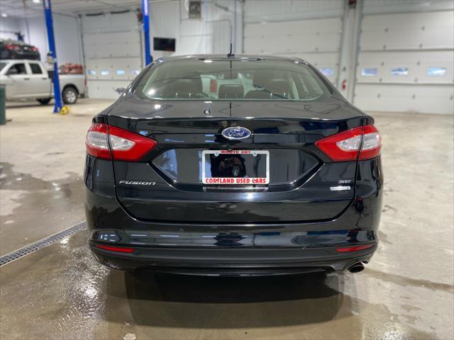 used 2016 Ford Fusion car, priced at $9,000